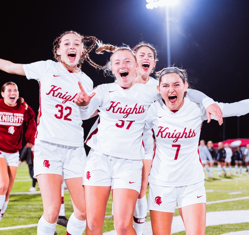 Women Soccer players celebrating