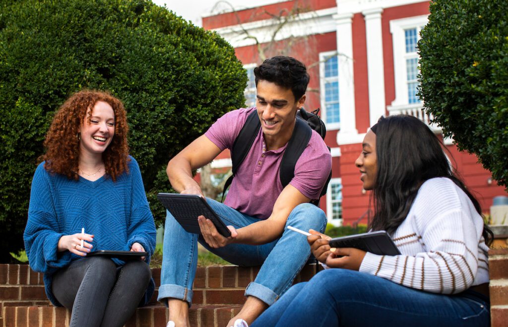 Students outside with iPads.