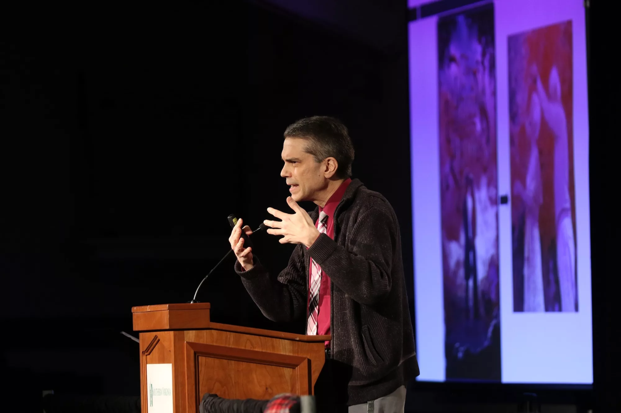 Dr. Rodriguez presenting at forum.