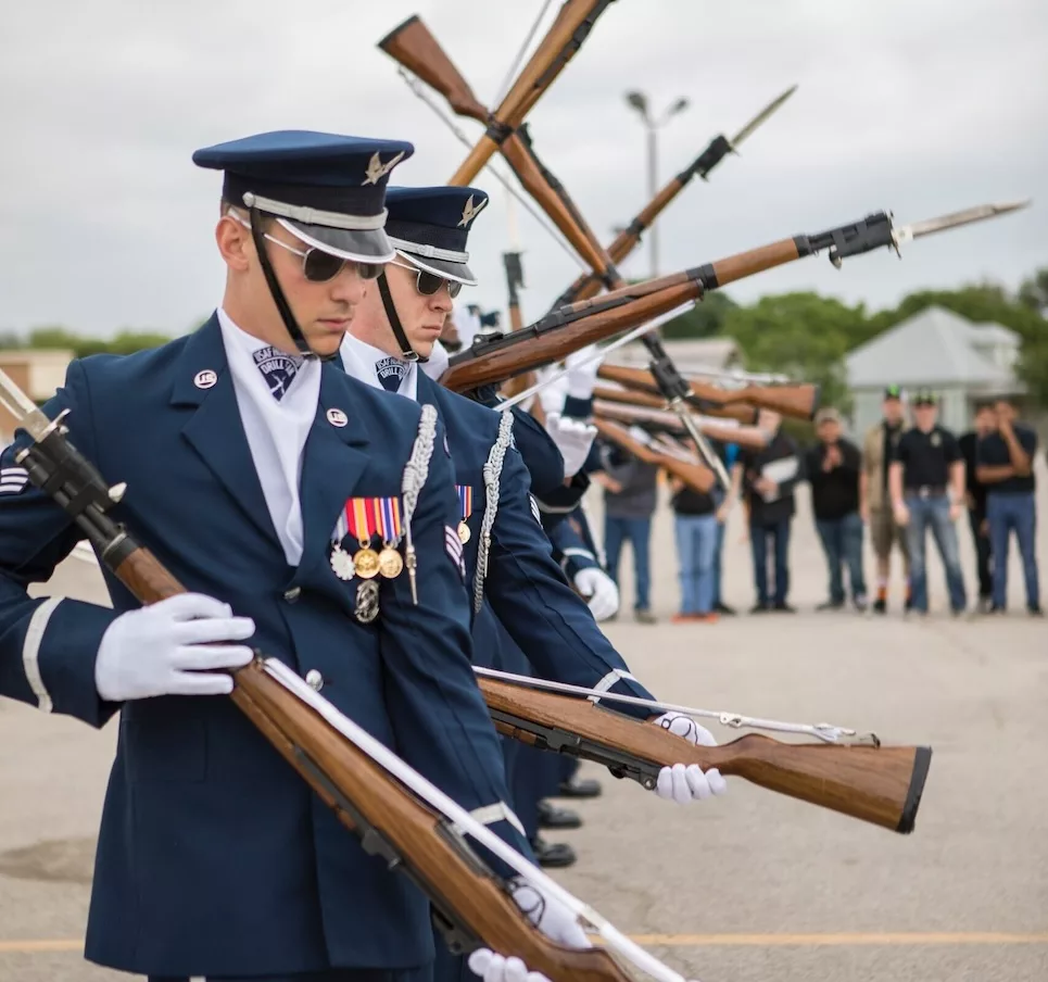 Military officers in a line - by Katrina Berban